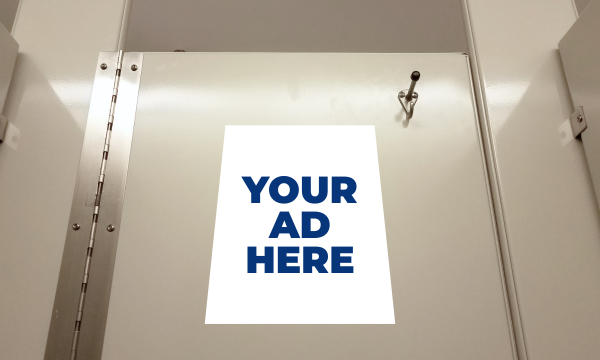 The words "your ad here" displayed inside a Town facility washroom.