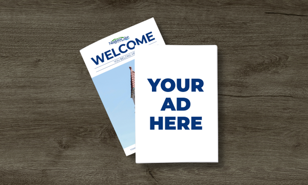 The words "your ad here" displayed inside the Town's New Residents Guide